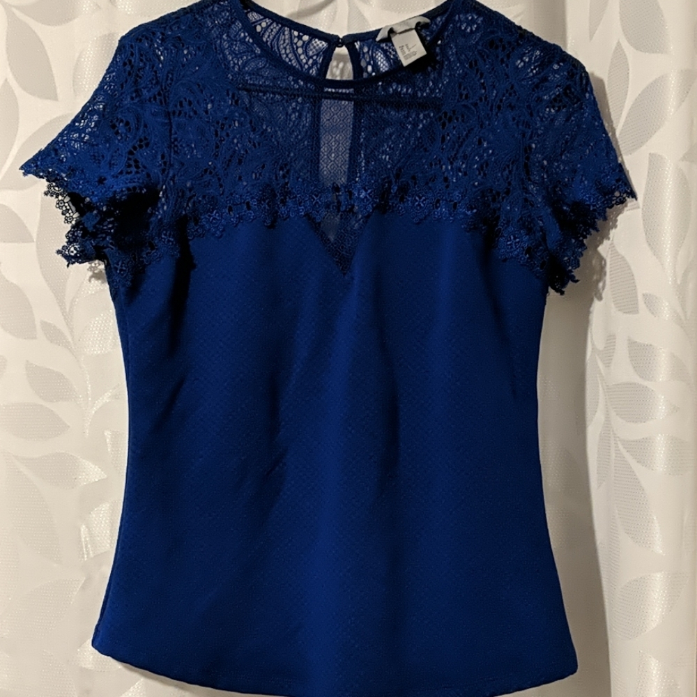 Blue capped sleeve shirt